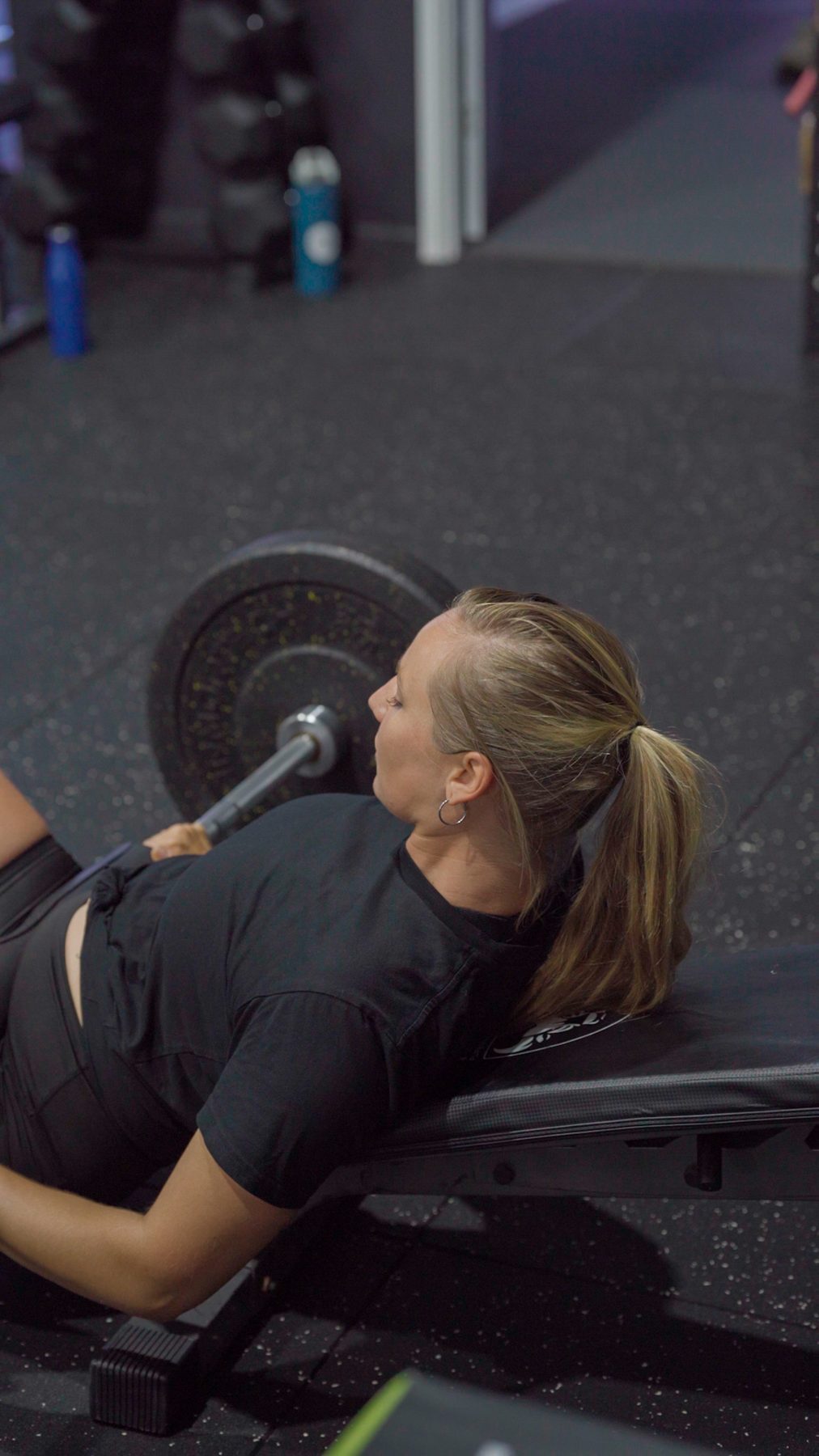 Member doing a barbell hip thrust